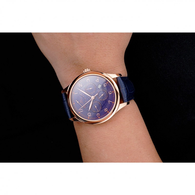 Réplicas de relojes IWC Portugieser Power Reserve de alta calidad con esfera azul, caja de oro rosa y correa de cuero azul